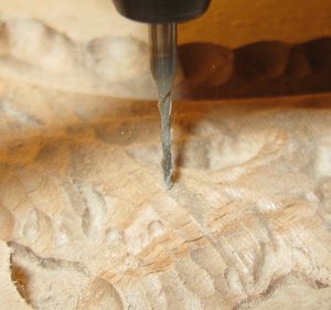 игрался с настройками фотоаппарата и &quot;поймал&quot; фрезу во время работы на скорости ~19000об/мин<br />видно как стружка разлетается во все стороны... потрясающе...<br />можно собрать 10 фотиков засинхать их сделать серию снимков каждые 0,01сек... наблюдая как &quot;работает&quot; фреза под разной нагрузкой и скоростями... (29095 просмотров) <a class='original' href='./download/file.php?id=25410&mode=view' target=_blank>Загрузить оригинал (687.52 КБ)</a>